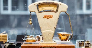 brown and beige weighing scale