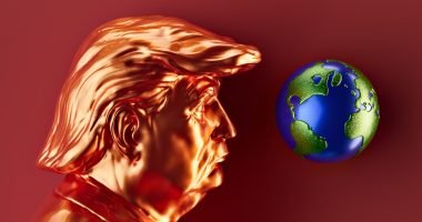 A golden trump looks at planet earth.
